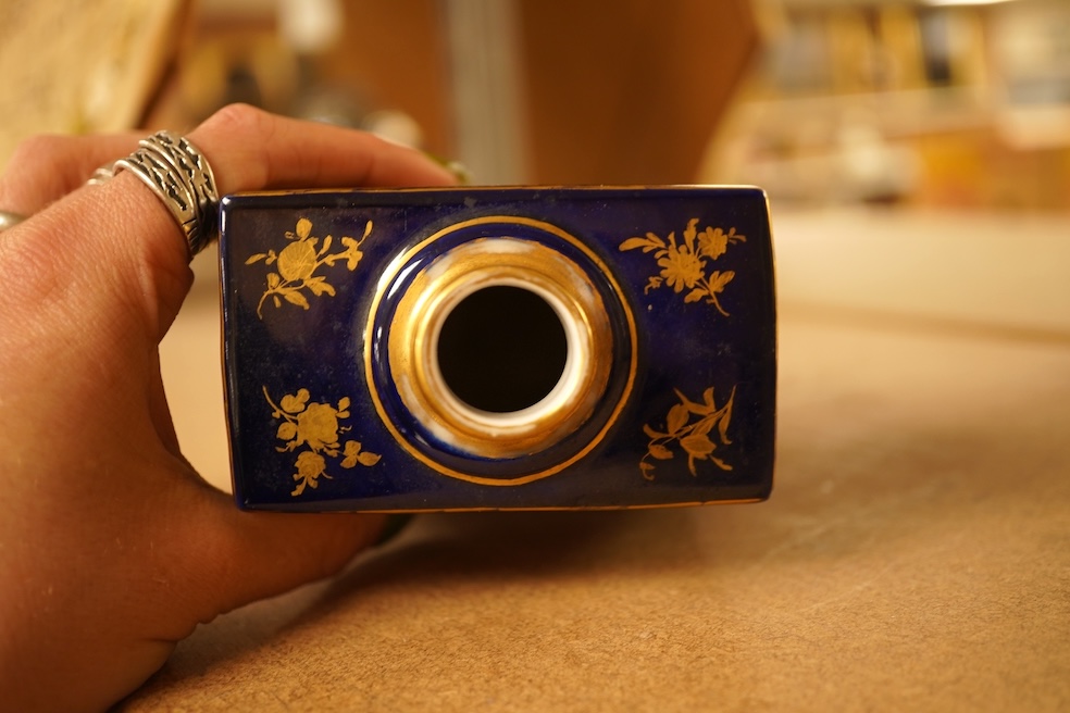 A Vienna style porcelain tea cannister, hand painted with figures, 15cm high